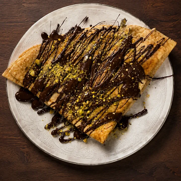 Crêpe au chocolat noir Équatoriale et éclats de pistache, la spéciale Billy